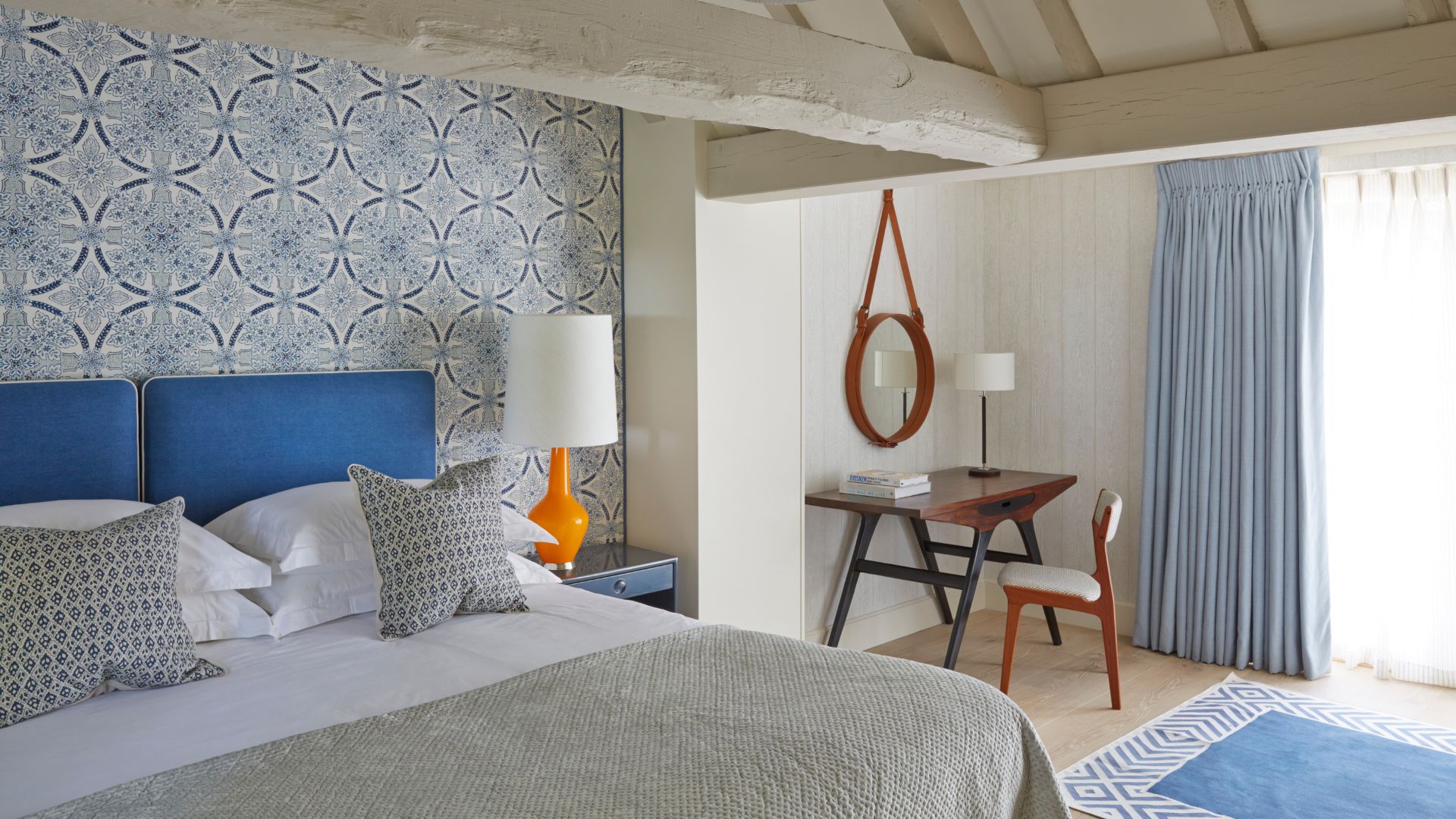 Intimate Room with plush bedding and contemporary Cotswold styling