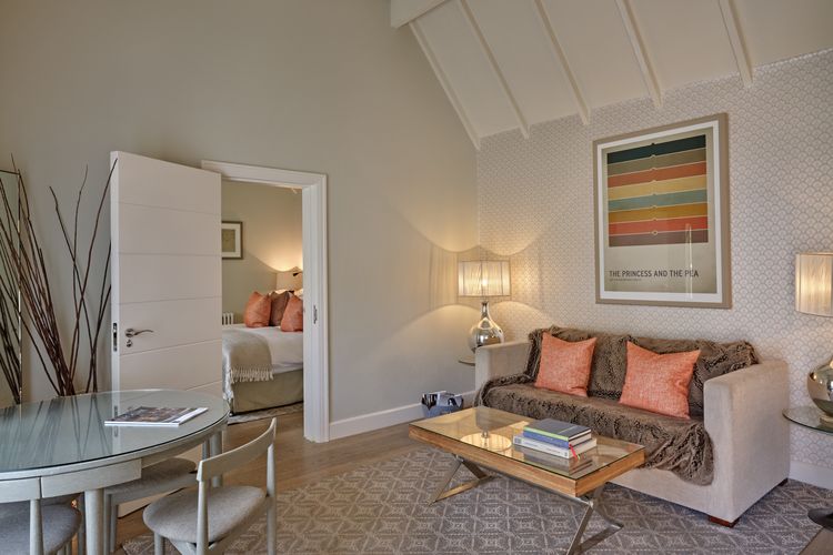 Courtyard Suite with separate lounge and direct patio access